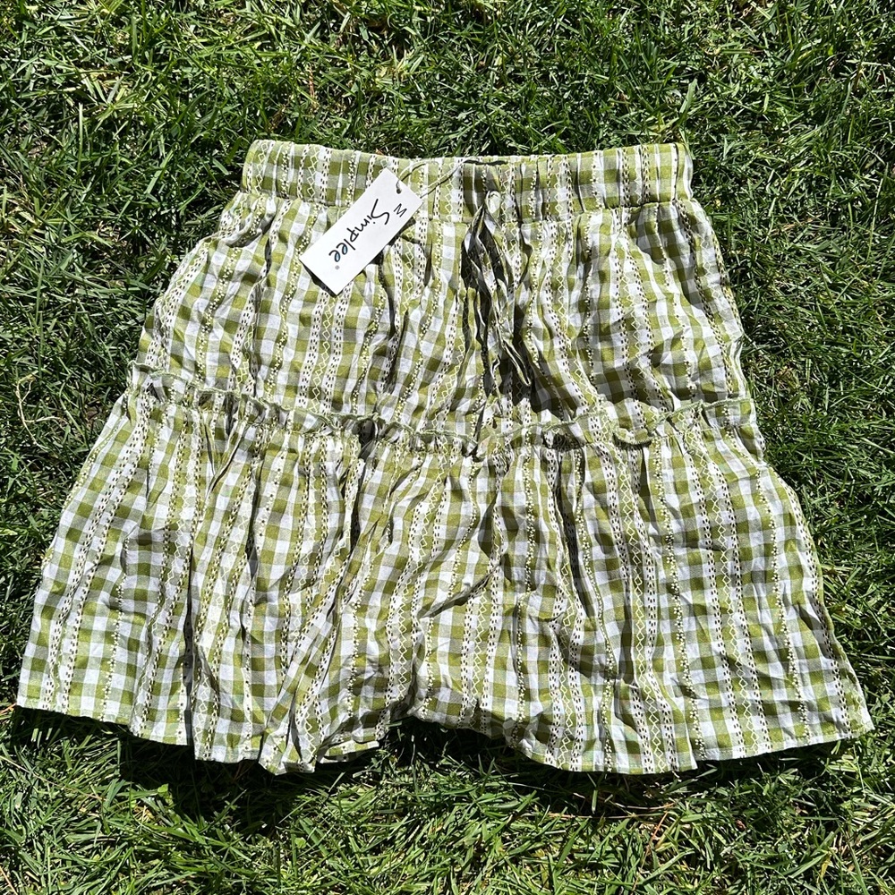 green and white skirt